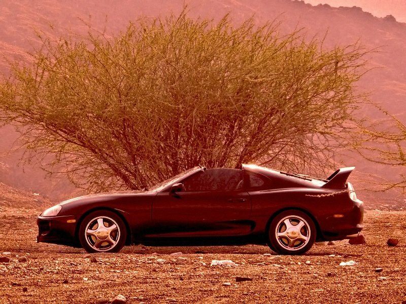 Toyota Supra عملية فيس ليفت IV (A80)، كوبيه — منظر من الجانب الأيسر